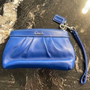 Blue, never used, coach wristlet.